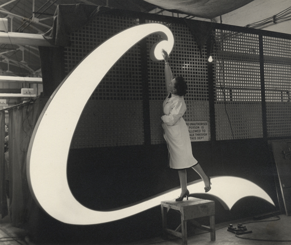 Polishing neon sign, 1954